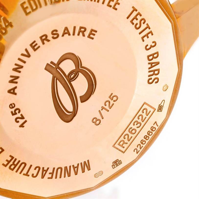 This image shows the case back of a Breitling Navitimer R26322 Men's Rose Gold Black Dial R26322 Men's Rose Gold Black Dial watch, highlighting its 125th Anniversary edition.