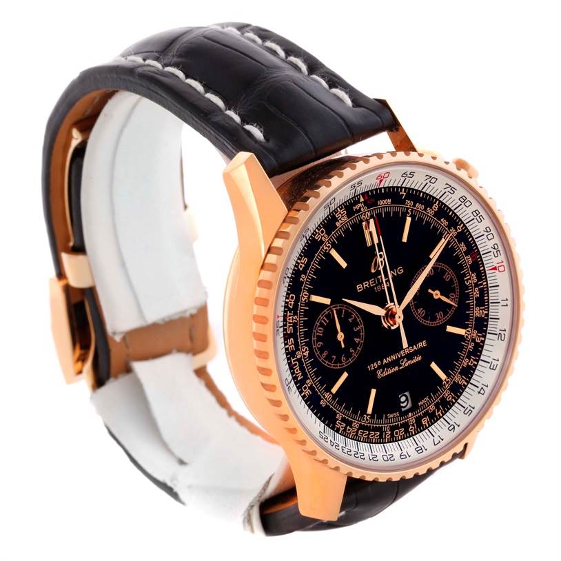 This image shows a Breitling Navitimer R26322 Men's Rose Gold Black Dial R26322 Men's Rose Gold Black Dial watch at an angled side view, highlighting its black leather strap and intricate dial design.