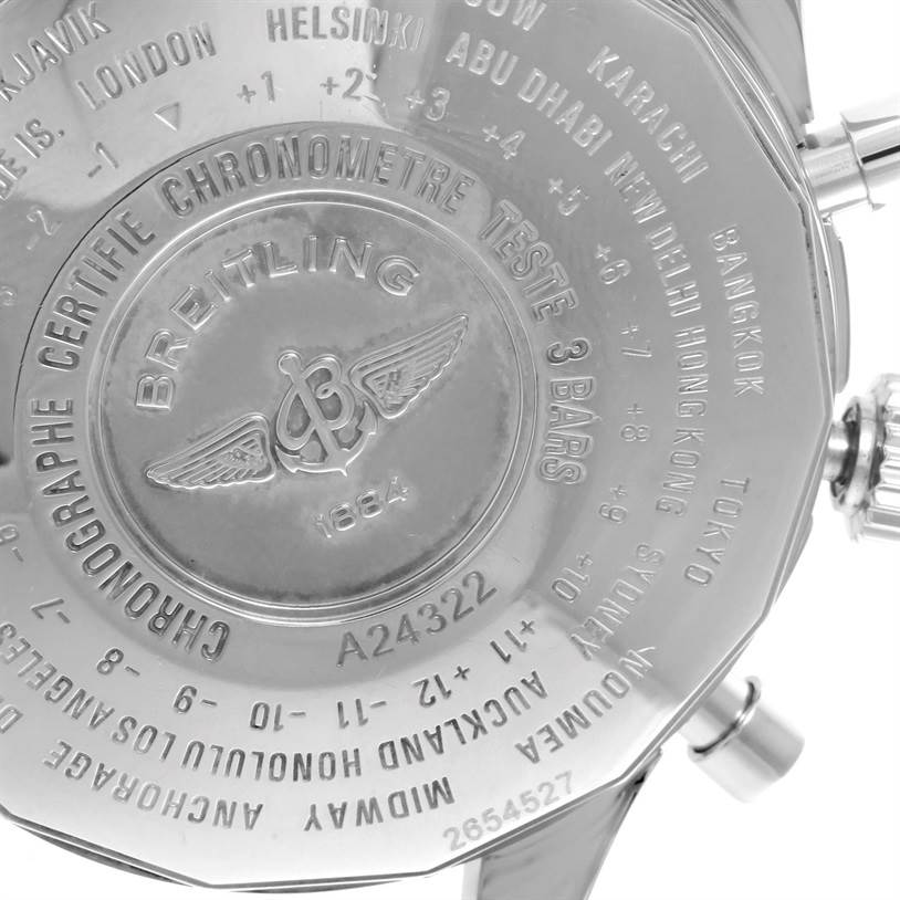 The image shows the back case of a Breitling Navitimer A24322 Men
s Stainless Steel Black Dial A24322 Men
s Stainless Steel Black Dial watch from a close-up angle, highlighting the engravings and serial number.