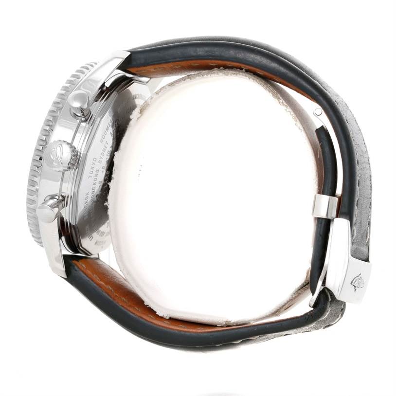 This Breitling Navitimer A24322 Men
s Stainless Steel Black Dial A24322 Men
s Stainless Steel Black Dial watch is shown from the side, displaying the crown, pushers, and part of the band with its clasp.