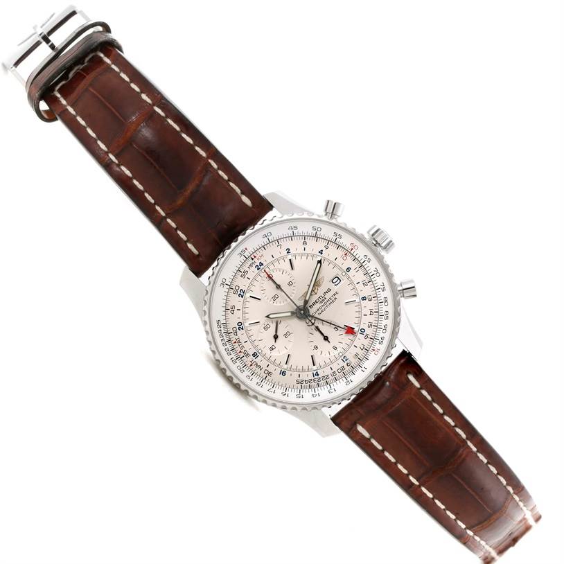 This image shows a top-down view of a Breitling Navitimer A24322 Men's Stainless Steel Silver Dial A24322 Men's Stainless Steel Silver Dial watch with a brown leather strap.