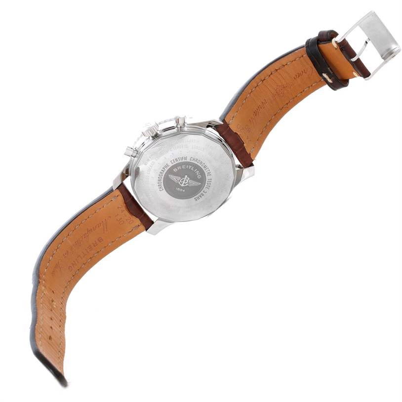 The image shows the back of a Breitling Navitimer A24322 Men's Stainless Steel Silver Dial A24322 Men's Stainless Steel Silver Dial watch, including its leather strap and case back.