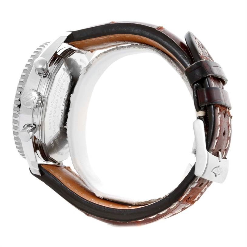 This image shows the Breitling Navitimer A24322 Men's Stainless Steel Silver Dial A24322 Men's Stainless Steel Silver Dial watch from a side angle, highlighting its case back, crown, pushers, and leather strap.