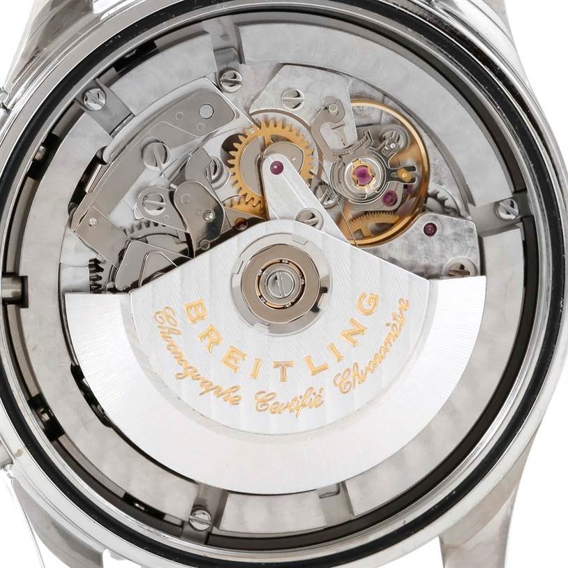 The image shows the transparent case back of a Breitling Navitimer A24322 Men's Stainless Steel Black Dial A24322 Men's Stainless Steel Black Dial watch, revealing its internal mechanical movement.