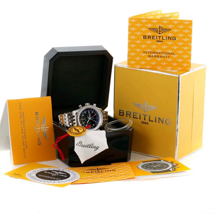 The image displays a Breitling Navitimer A24322 Men's Stainless Steel Black Dial A24322 Men's Stainless Steel Black Dial watch at an angle showing its front, along with its box, warranty card, and manuals.