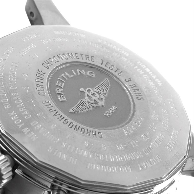 This close-up shows the case back of a Breitling Navitimer A24322 Men's Stainless Steel Black Dial A24322 Men's Stainless Steel Black Dial, highlighting the engraved logo and text.