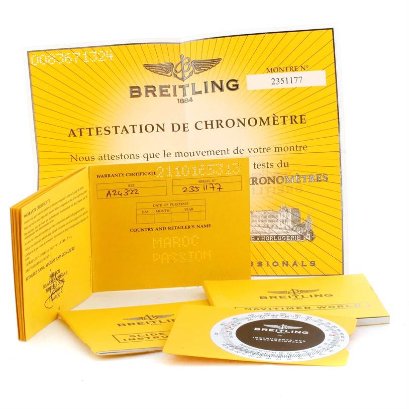The image shows warranty documentation and certification papers for a Breitling Navitimer A24322 Men's Stainless Steel Blue Dial A24322 Men's Stainless Steel Blue Dial watch.