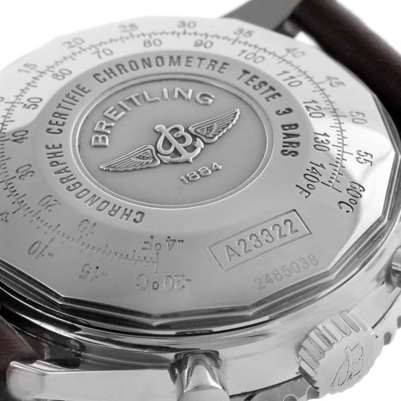 The image shows the case back and part of the crown of a Breitling Navitimer A23322 Men's Stainless Steel Silver Dial A23322 Men's Stainless Steel Silver Dial, with engravings and the model number visible.