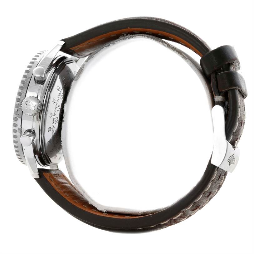 This image shows a Breitling Navitimer A23322 Men's Stainless Steel Silver Dial A23322 Men's Stainless Steel Silver Dial watch from a side angle, highlighting the crown, pushers, and the leather strap's interior and exterior.