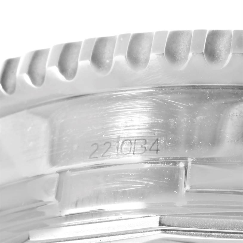 The image shows a close-up of the bezel and serial number engraving of a Breitling Navitimer A24322 Men's Stainless Steel Silver Dial A24322 Men's Stainless Steel Silver Dial watch.