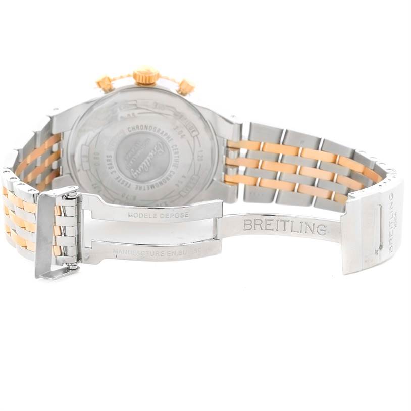 The image shows the back and bracelet of the Breitling Navitimer C23340 Men
s Steel and Gold (two tone) Silver Dial C23340 Men
s Steel and Gold (two tone) Silver Dial watch, highlighting the clasp and caseback.