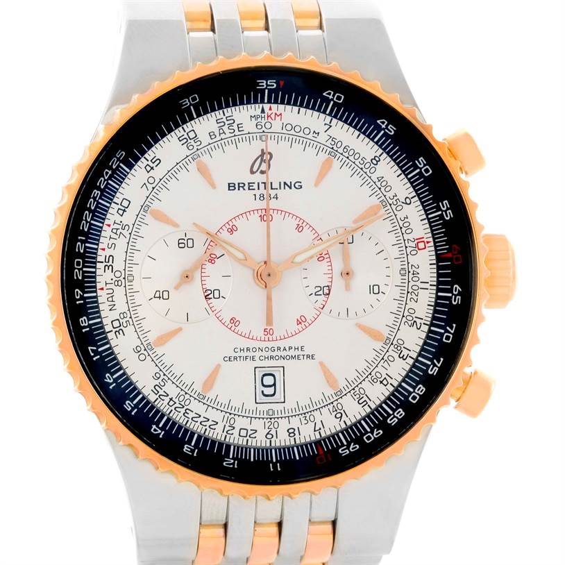 This is a front view of a Breitling Navitimer C23340 Men
s Steel and Gold (two tone) Silver Dial C23340 Men
s Steel and Gold (two tone) Silver Dial watch showing its dial, chronograph subdials, bezel, and part of the bracelet.