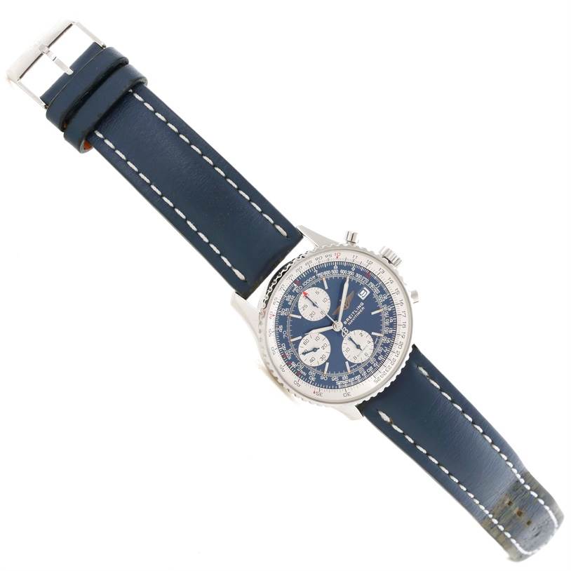 The image shows a top-down view of a Breitling Navitimer A13022 Men's Stainless Steel Blue Dial A13022 Men's Stainless Steel Blue Dial watch featuring its face, case, and blue leather strap.