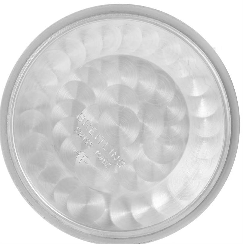 The image shows the inside case back of a Breitling Navitimer A13322 Men's Stainless Steel Blue Dial A13322 Men's Stainless Steel Blue Dial watch, viewed from directly above.