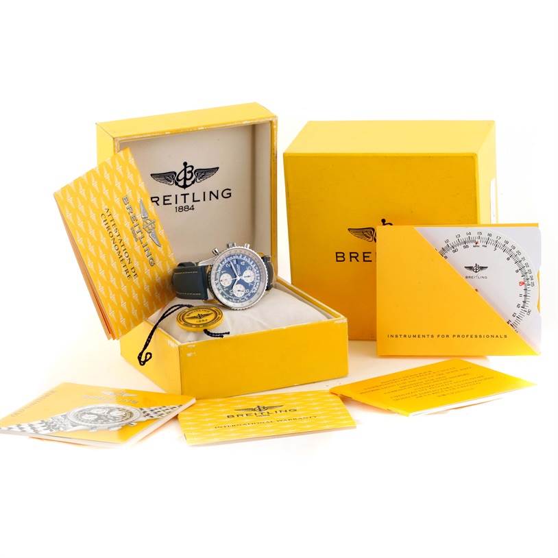The image shows a Breitling Navitimer A13322 Men's Stainless Steel Blue Dial A13322 Men's Stainless Steel Blue Dial watch with its box, papers, and additional accessories from a front angle.