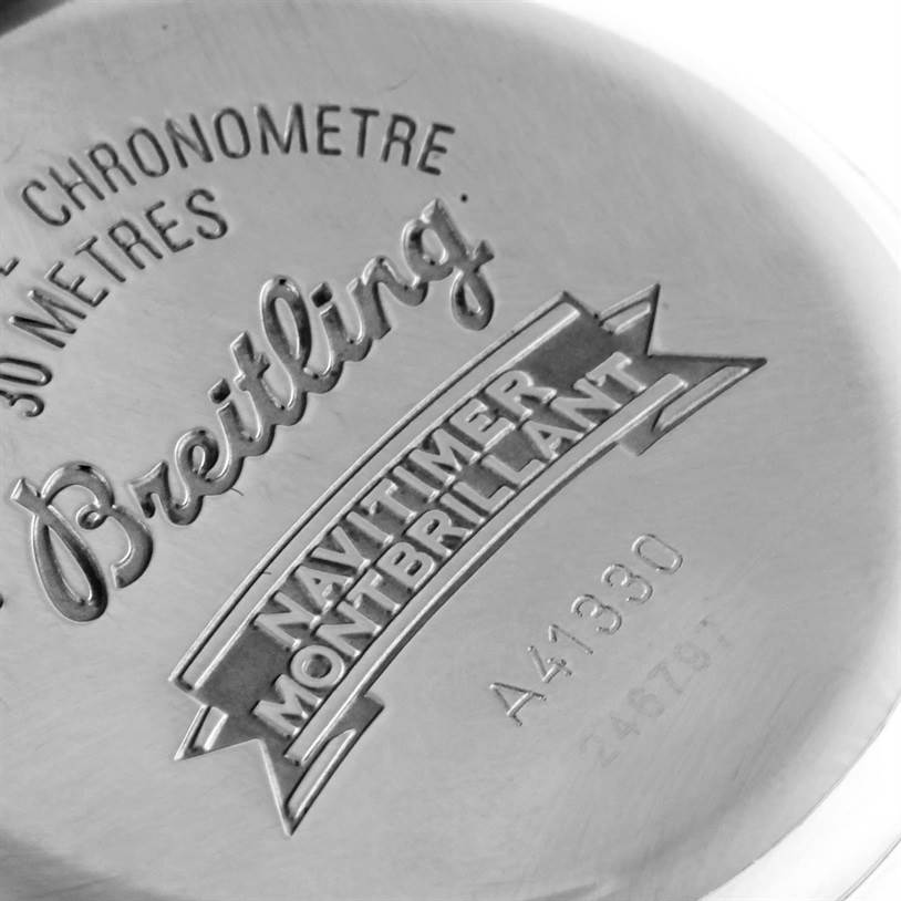 This image shows the back cover of a Breitling Navitimer A41330 Men's Stainless Steel Silver Dial A41330 Men's Stainless Steel Silver Dial Montbrillant watch with engravings.