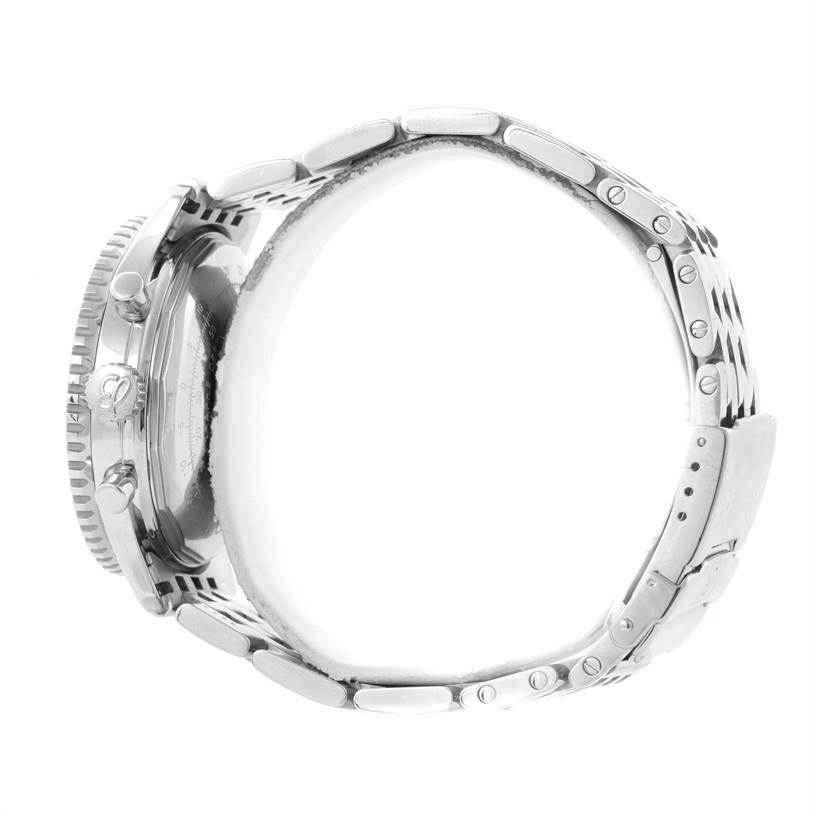 This side view of the Breitling Navitimer A13022 Men
s Stainless Steel Blue Dial A13022 Men
s Stainless Steel Blue Dial watch shows the stainless steel case and part of the linked bracelet.