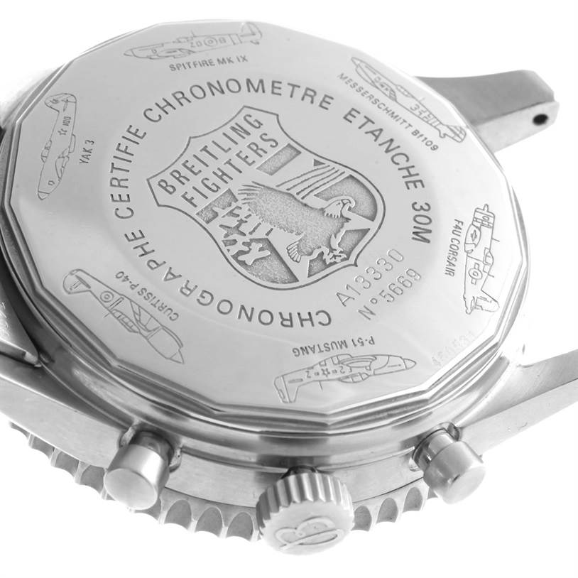 The image shows the case back of a Breitling Navitimer A13330 Men's Stainless Steel Silver Dial A13330 Men's Stainless Steel Silver Dial watch featuring various engraved aircraft and brand details.