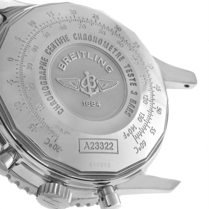 The image shows the back case of a Breitling Navitimer A23322 Men's Stainless Steel Silver Dial A23322 Men's Stainless Steel Silver Dial watch, highlighting its engravings and crown.