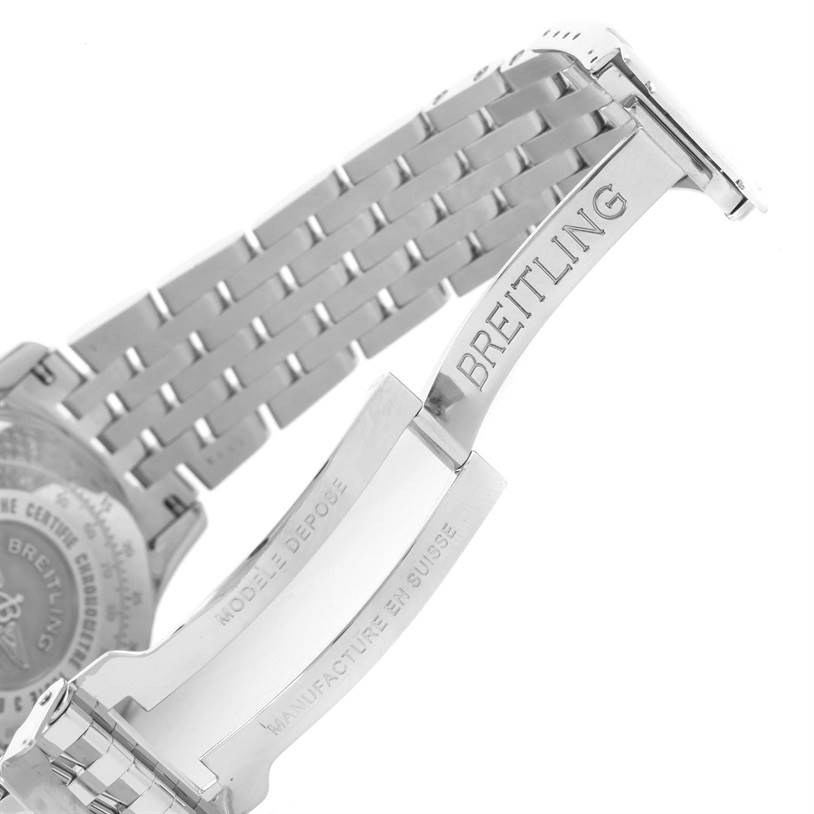 The image shows the clasp and part of the bracelet of a Breitling Navitimer A23322 Men's Stainless Steel Silver Dial A23322 Men's Stainless Steel Silver Dial watch, highlighting the brand's engraving.