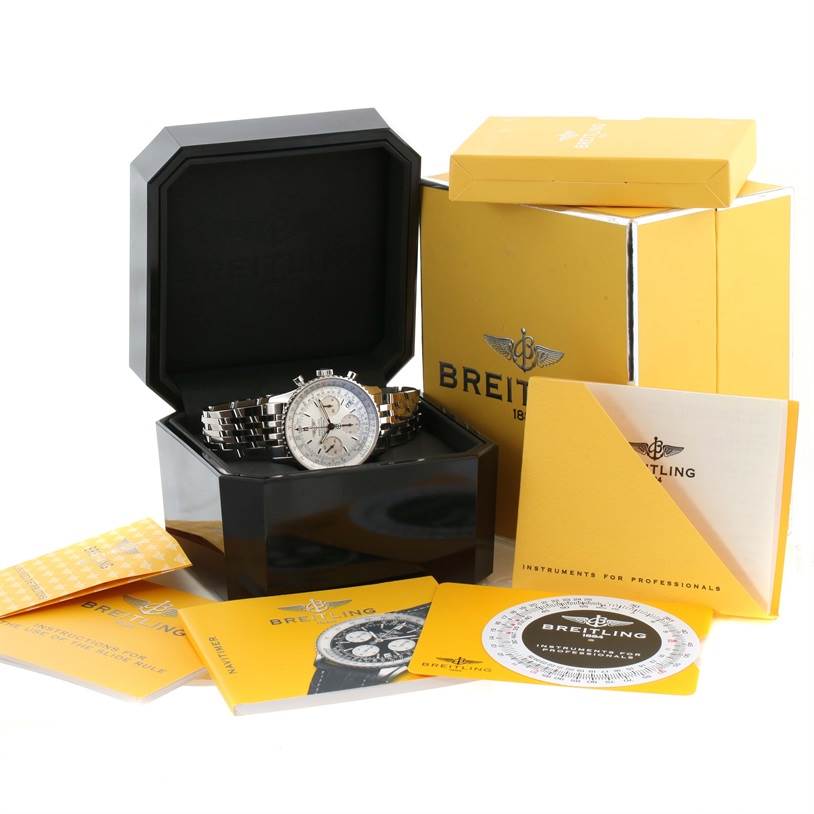 This image shows a Breitling Navitimer A23322 Men's Stainless Steel Silver Dial A23322 Men's Stainless Steel Silver Dial watch in its open box, accompanied by packaging, manuals, and warranty cards.
