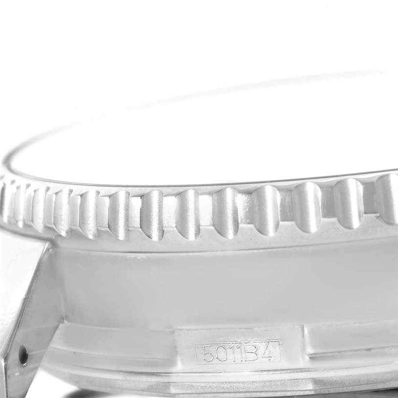 This image shows a close-up of the bezel and part of the case of the Breitling Navitimer A24322 Men
s Stainless Steel Black Dial A24322 Men
s Stainless Steel Black Dial watch.