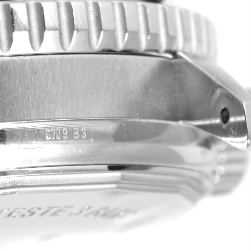 Close-up of the side view showing the casing and bezel detailing of the Breitling Navitimer A26322 Men's Stainless Steel Brown Dial A26322 Men's Stainless Steel Brown Dial watch.