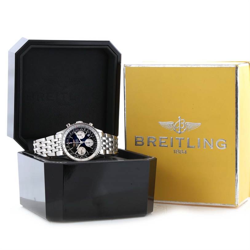 The Breitling Navitimer A23322 Men's Stainless Steel Black Dial A23322 Men's Stainless Steel Black Dial watch is displayed face-up in its black case, with the yellow box shown beside it.