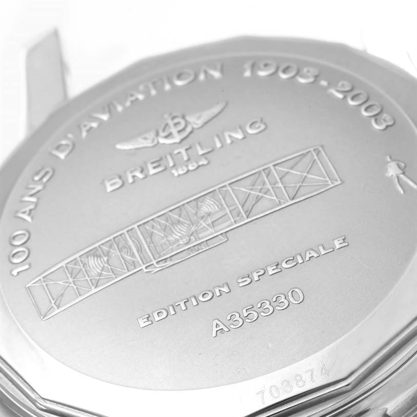 The image shows the back case of a Breitling Navitimer A35330 Men's Stainless Steel Black Dial A35330 Men's Stainless Steel Black Dial watch, commemorating "100 Ans d'Aviation 1903-2003."