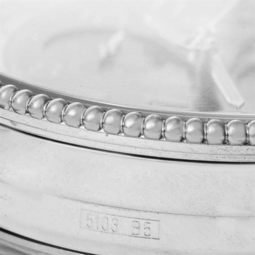 This close-up image shows the bezel and part of the dial of a Breitling Navitimer A35330 Men's Stainless Steel Black Dial A35330 Men's Stainless Steel Black Dial watch.