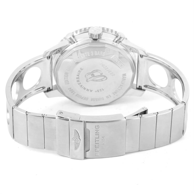 The image shows the back and clasp of a Breitling Navitimer A26322 Men's Stainless Steel Black Dial A26322 Men's Stainless Steel Black Dial watch, highlighting its stainless steel bracelet and engraved case back.