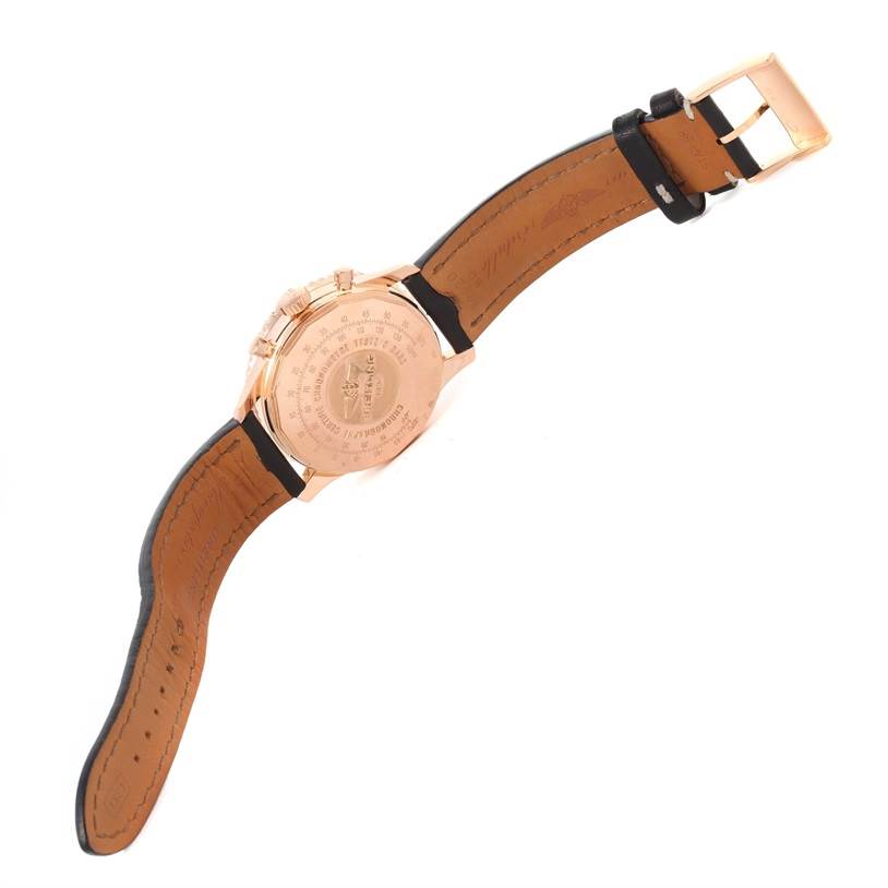 The image shows the back of a Breitling Navitimer RB0120 Men's Rose Gold Black Dial RB0120 Men's Rose Gold Black Dial watch, including the case back and leather strap.