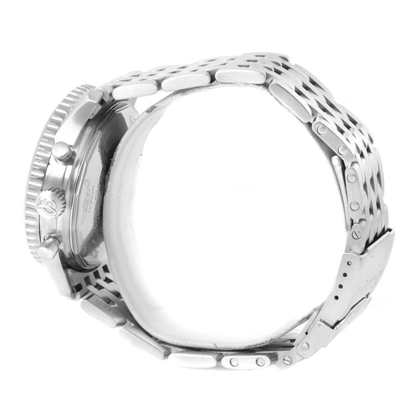 The image shows a side view of the Breitling Navitimer A13330 Men
s Stainless Steel Silver Dial A13330 Men
s Stainless Steel Silver Dial watch, focusing on its crown, chronograph pushers, and metal bracelet.