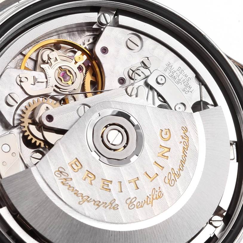 The image shows a close-up view of the Breitling Navitimer A13022 Men
s Stainless Steel Blue Dial A13022 Men
s Stainless Steel Blue Dial
s movement mechanism and rotor from the back case.