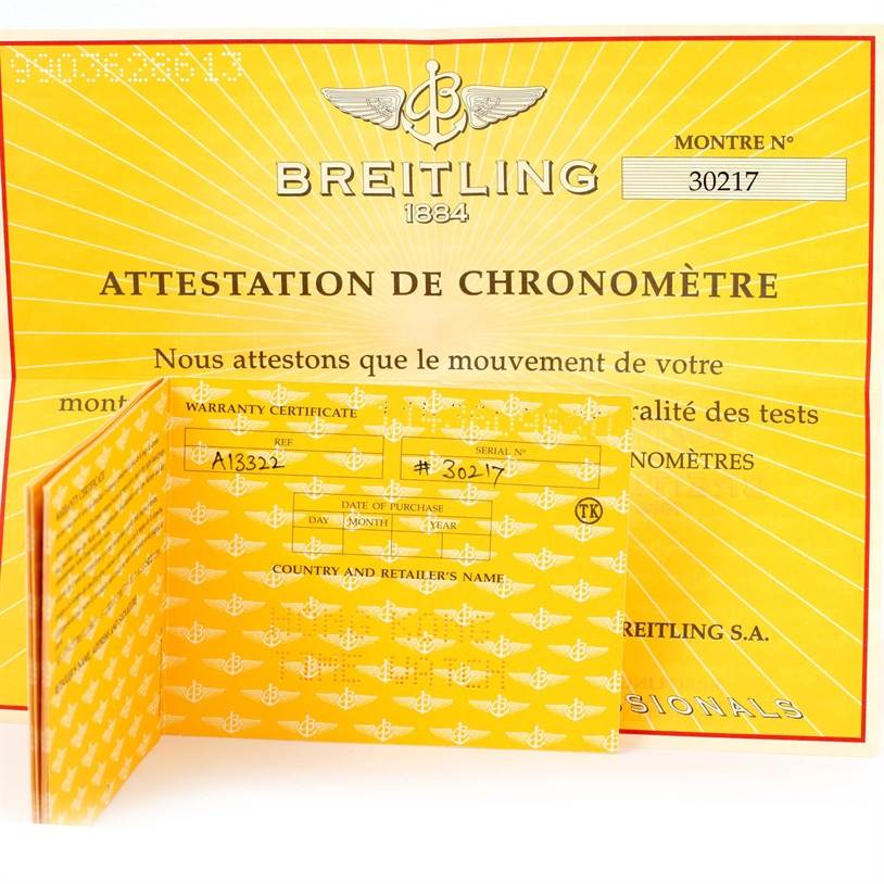The image shows the warranty certificate and attestation of chronometer document for a Breitling Navitimer A13022 Men
s Stainless Steel Blue Dial A13022 Men
s Stainless Steel Blue Dial watch.