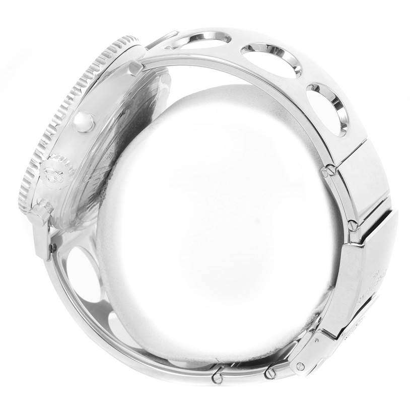 The image shows a side view of a Breitling Navitimer AB0120 Men
s Stainless Steel Black Dial AB0120 Men
s Stainless Steel Black Dial watch, highlighting the bezel, crown, and partially visible metal bracelet.