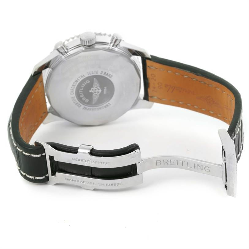 The image shows the back of the Breitling Navitimer A24322 Men
s Stainless Steel Silver Dial A24322 Men
s Stainless Steel Silver Dial watch, including its clasp, case back, and leather strap.