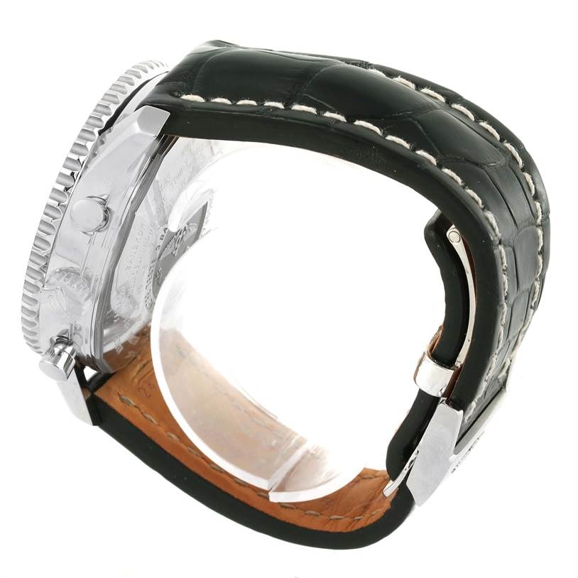 The image shows a side view of the Breitling Navitimer A24322 Men
s Stainless Steel Silver Dial A24322 Men
s Stainless Steel Silver Dial with its case, bezel, crown, and leather strap.