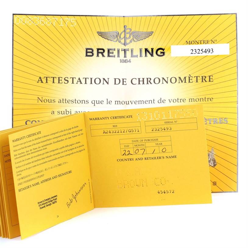 The image shows warranty certificates and chronometer attestation documents for a Breitling Navitimer A24322 Men
s Stainless Steel Silver Dial A24322 Men
s Stainless Steel Silver Dial watch.