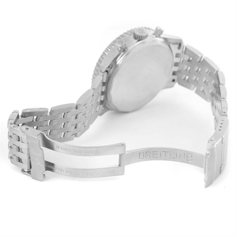 The image shows the backside of the Navitimer model by Breitling, highlighting the bracelet and clasp.