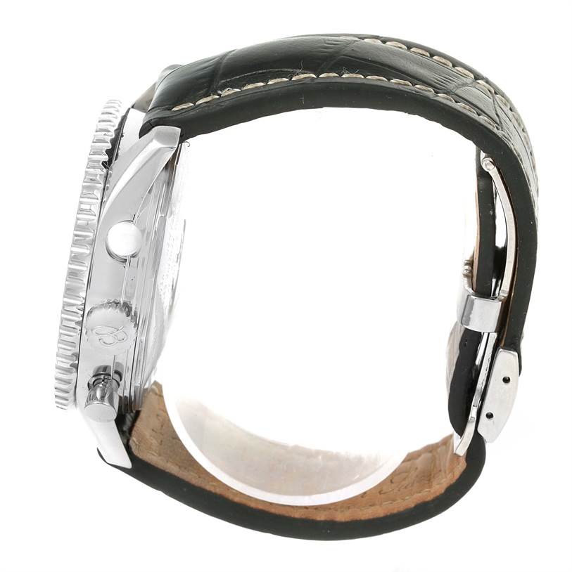 The image shows a side view of the Breitling Navitimer A24322 Men's Stainless Steel Blue Dial A24322 Men's Stainless Steel Blue Dial watch, highlighting the case, crown, pushers, and leather strap with clasp.