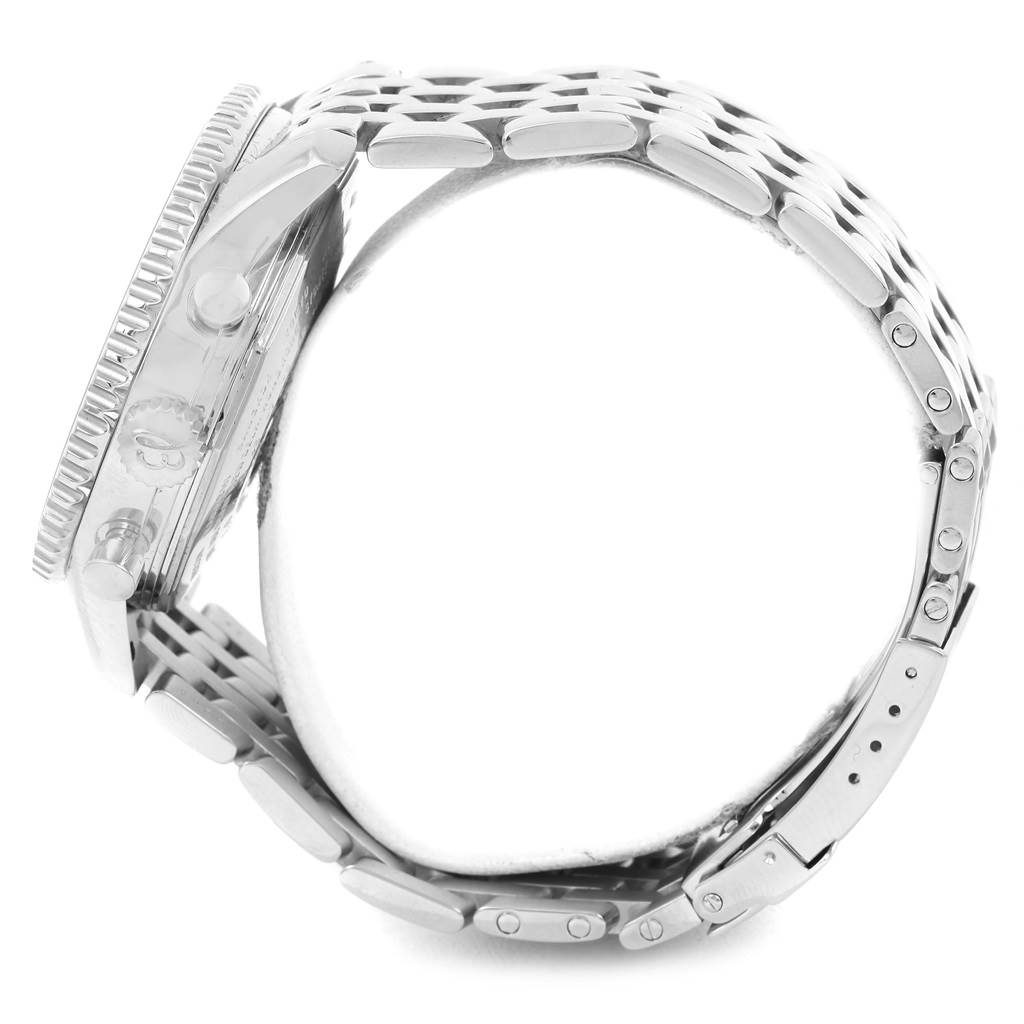 The image shows a side view of the Breitling Navitimer A24322 Men's Stainless Steel Silver Dial A24322 Men's Stainless Steel Silver Dial watch, highlighting the case, crown, pushers, and metal bracelet.