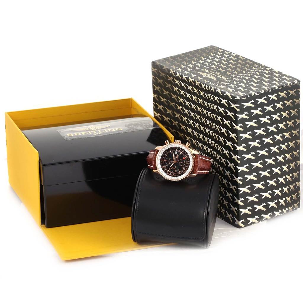 The image shows a Breitling Navitimer R24322 Men's Rose Gold Black Dial R24322 Men's Rose Gold Black Dial watch with its box and packaging at a slightly elevated angle.