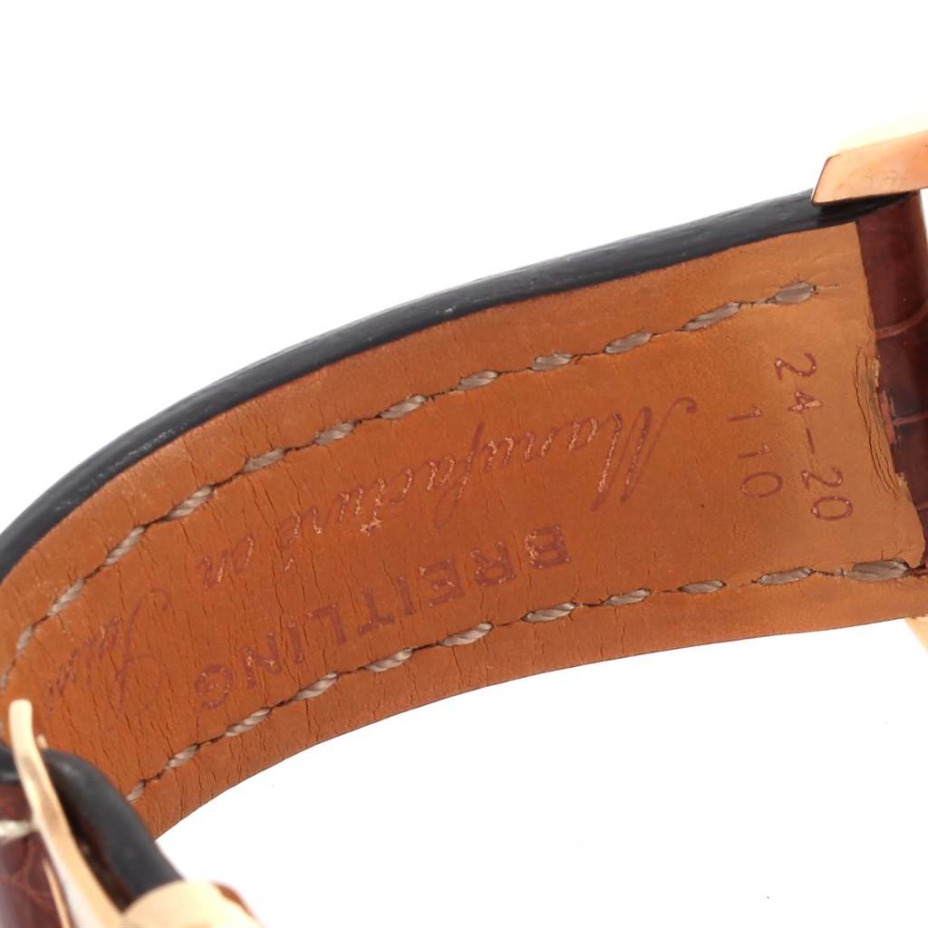 Close-up of the underside of a leather strap for a Breitling Navitimer R24322 Men's Rose Gold Black Dial R24322 Men's Rose Gold Black Dial watch, showing the stitching and brand inscription.