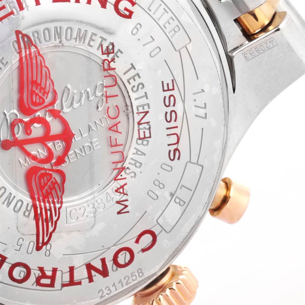 This image shows the case back and crown of a Breitling Navitimer C23340 Men's Steel and Gold (two tone) Silver Dial C23340 Men's Steel and Gold (two tone) Silver Dial watch.