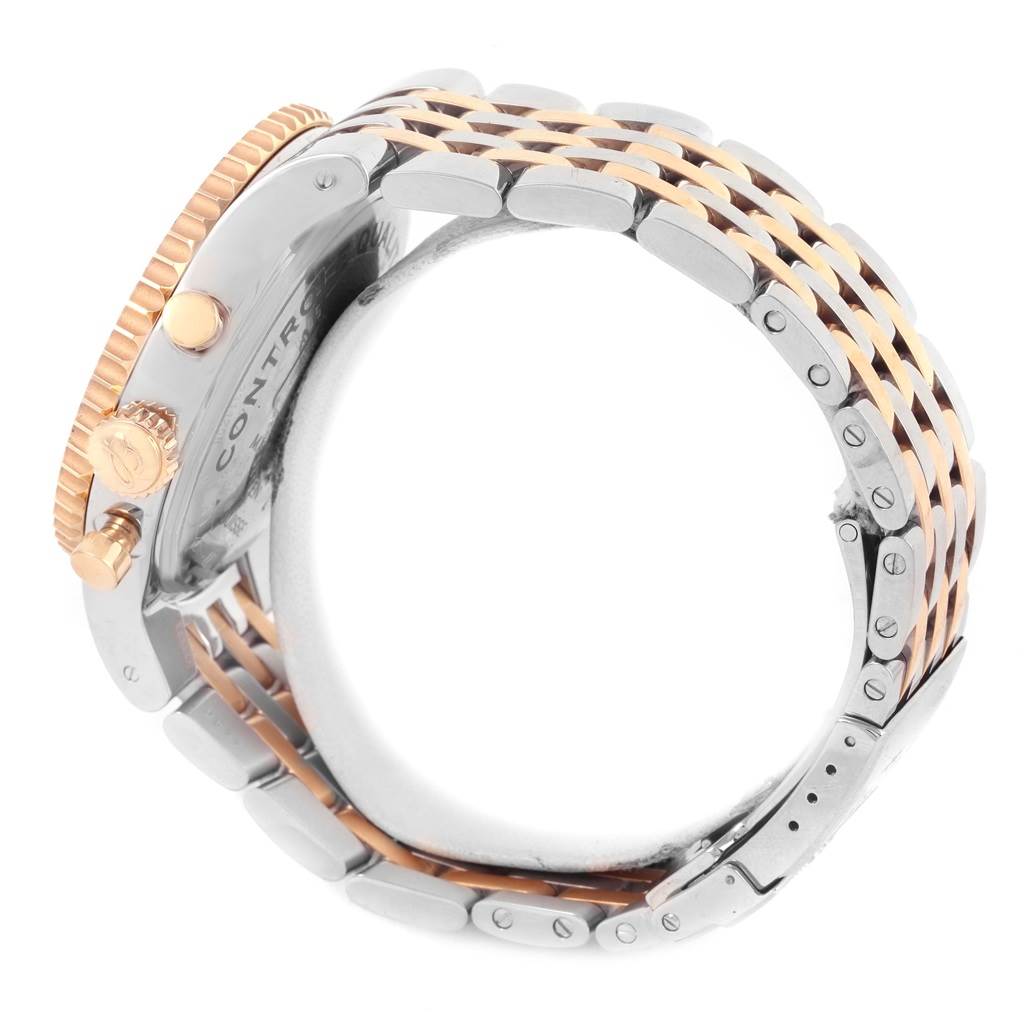 This image shows the side view of a Breitling Navitimer C23340 Men's Steel and Gold (two tone) Silver Dial C23340 Men's Steel and Gold (two tone) Silver Dial watch, highlighting the crown, pushers, and part of the bracelet.