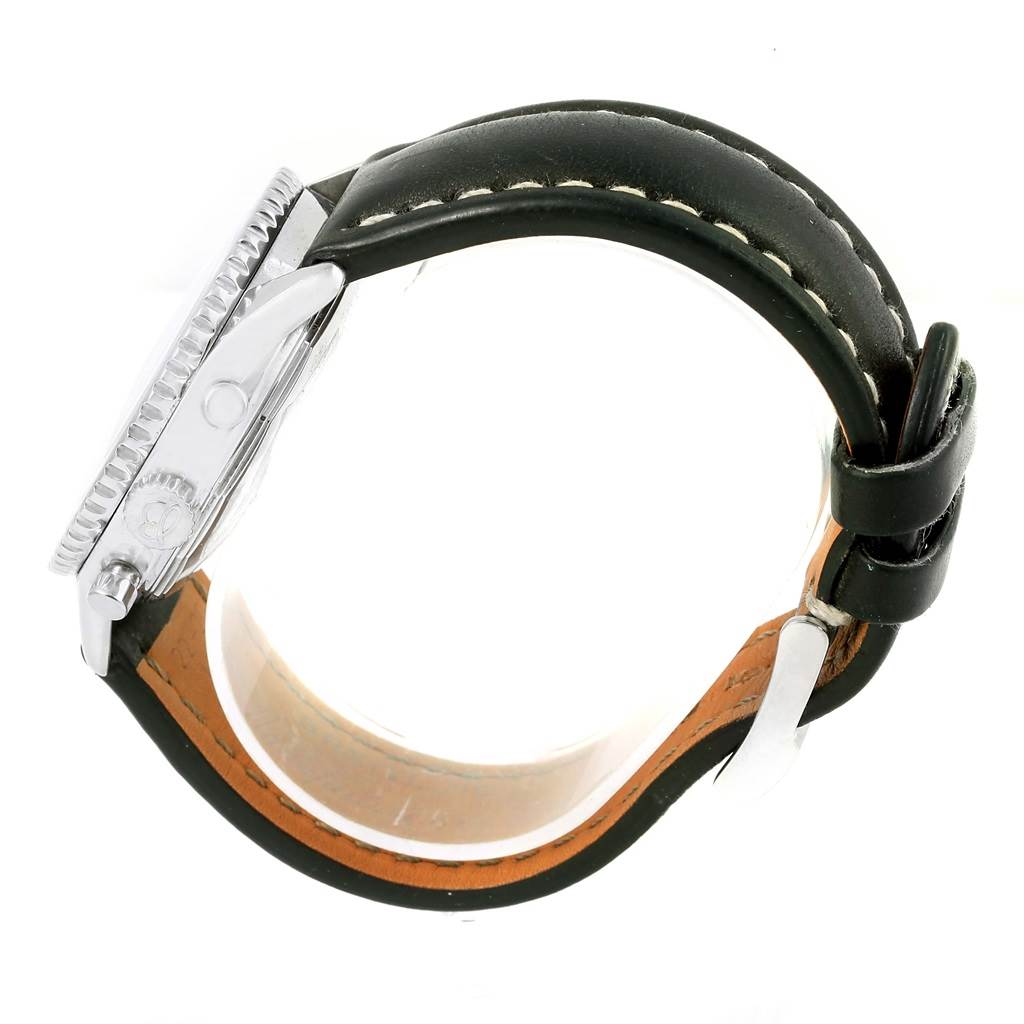 This side-angle view of the Breitling Navitimer A13322 Men's Stainless Steel Black Dial A13322 Men's Stainless Steel Black Dial shows the crown, case, and black leather strap with stitching.