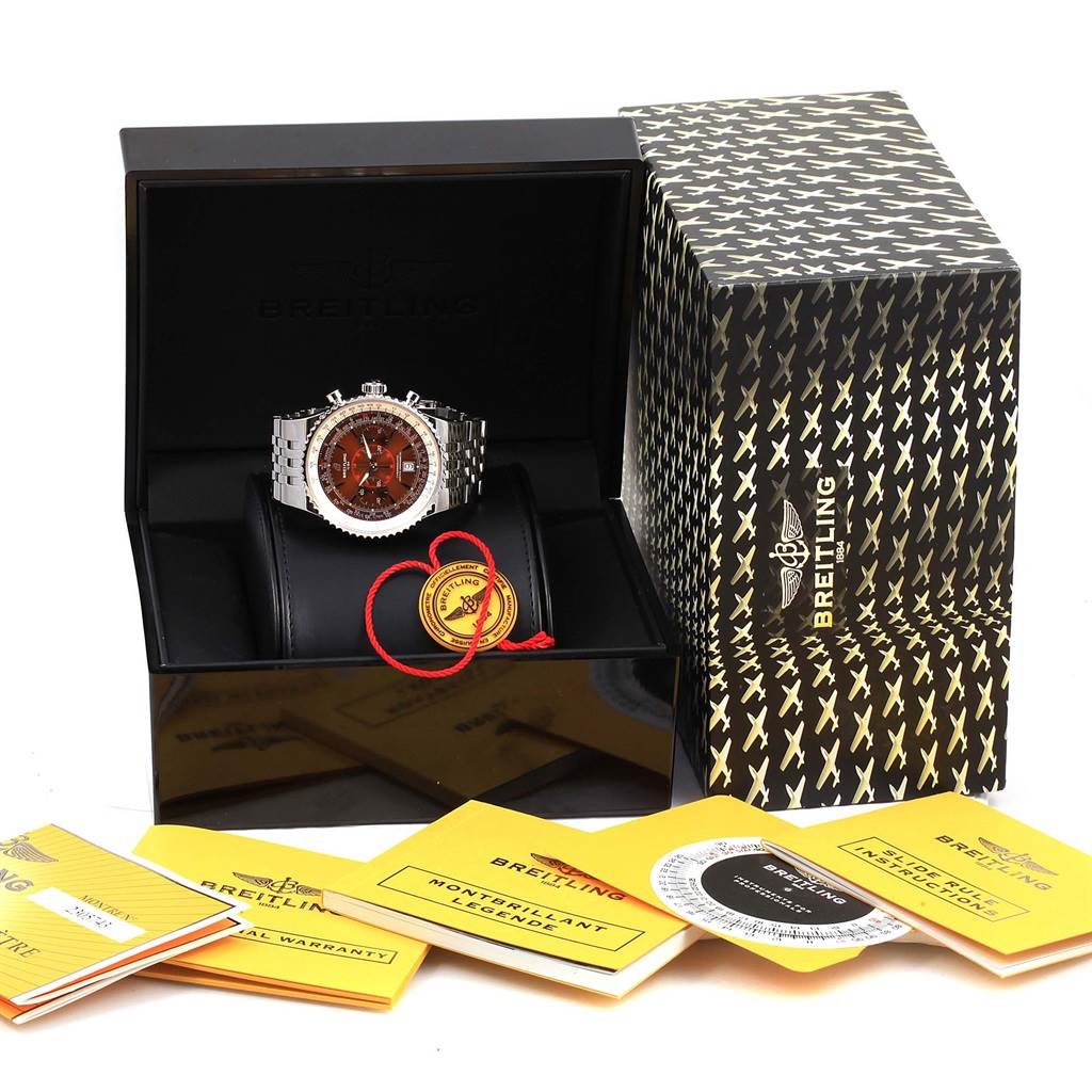 The Breitling Navitimer A23340 Men
s Stainless Steel Brown Dial A23340 Men
s Stainless Steel Brown Dial watch is shown front-on in an open box, accompanied by booklets and a warranty card.