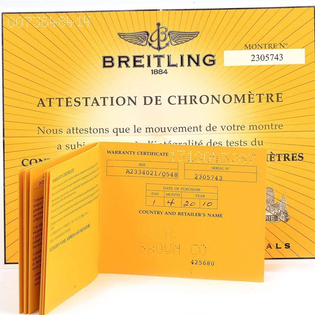 The image shows the warranty certificate and chronometer certification for the Breitling Navitimer A23340 Men
s Stainless Steel Brown Dial A23340 Men
s Stainless Steel Brown Dial model.