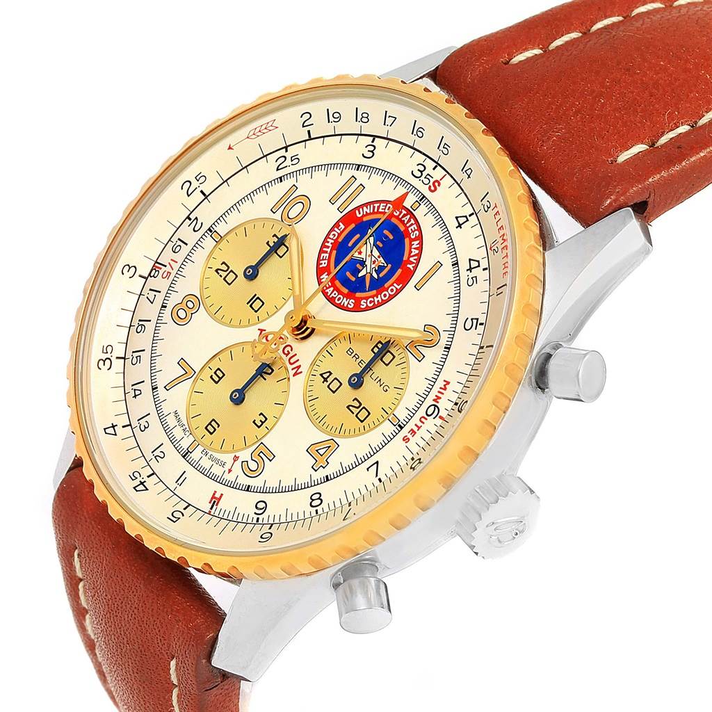The image shows a Navitimer model by Breitling from a three-quarter angle, highlighting the dial, bezel, crowns, and strap.